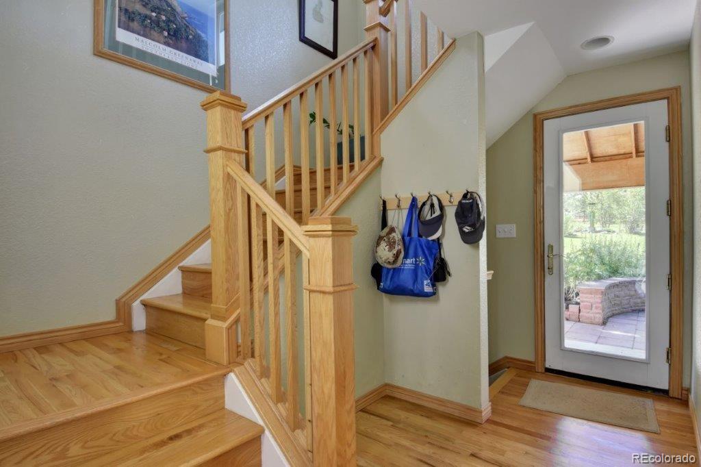 7856 Baseline Road Boulder, CO 80303 - Photo 11 of 40 a view of entryway and hall with wooden floor