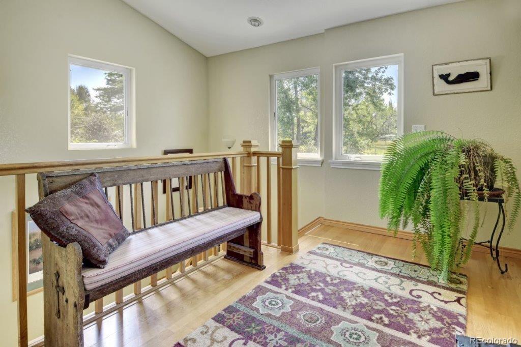 7856 Baseline Road Boulder, CO 80303 - Photo 12 of 40 a view of a living room and a rug
