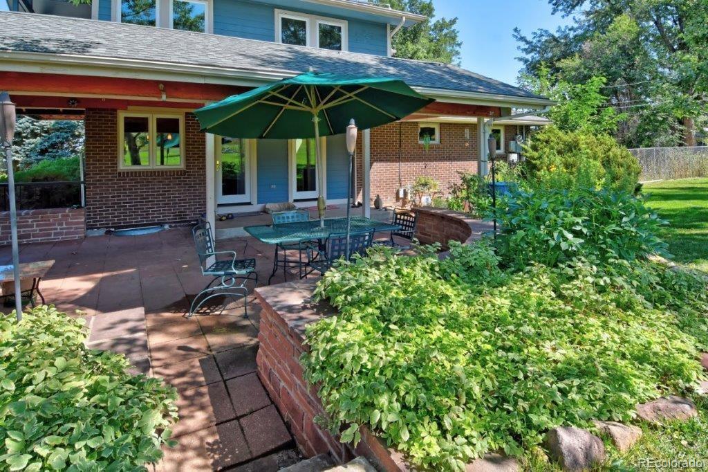 7856 Baseline Road Boulder, CO 80303 - Photo 26 of 40 a view of a house with backyard and sitting area