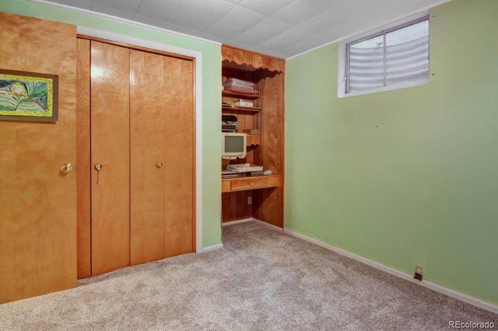 7856 Baseline Road Boulder, CO 80303 - Photo 27 of 40 an empty room with walk in closet and bathroom