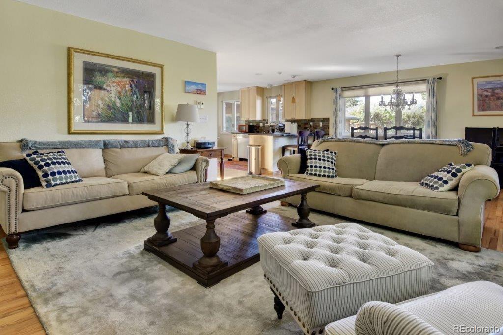 7856 Baseline Road Boulder, CO 80303 - Photo 5 of 40 a living room with furniture a rug and a window