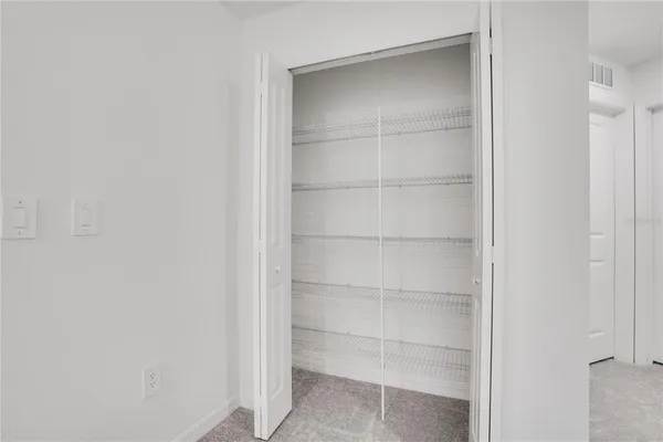 an empty room with a natural light