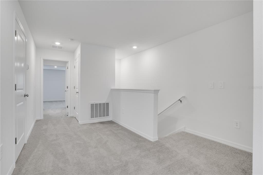 212 27th Street Southeast Ruskin, FL 33570 - Photo 19 of 46 an empty room with a natural light