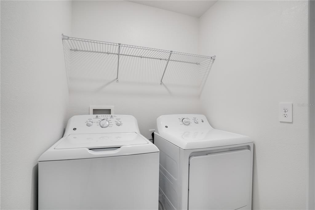 212 27th Street Southeast Ruskin, FL 33570 - Photo 32 of 46 a utility room with dryer and washer