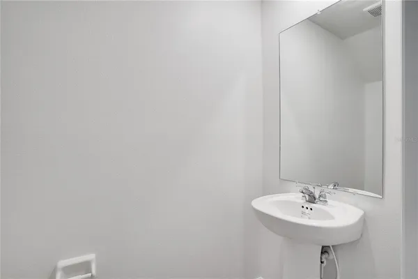 a view of backyard with green space