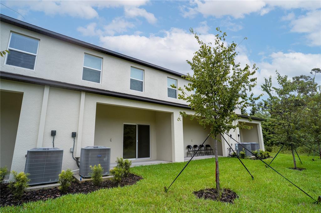 212 27th Street Southeast Ruskin, FL 33570 - Photo 36 of 46 a view of a house with a yard