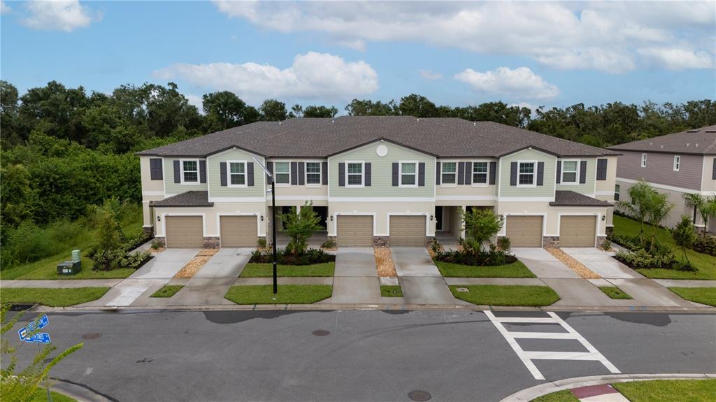 212 27th Street Southeast Ruskin, FL 33570 - Photo 38 of 46 a front view of a house with a yard