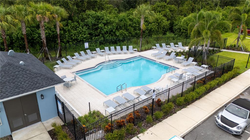 212 27th Street Southeast Ruskin, FL 33570 - Photo 45 of 46 a view of a balcony with two chairs and a table