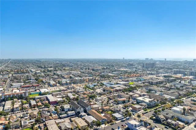 an aerial view of residential building with parking space