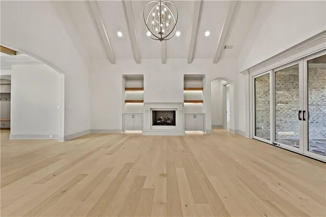 a view of a room with a flat screen tv