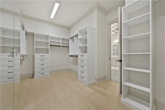 a view of a bathroom with sink bathtub and window