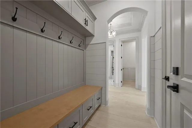 a view of a kitchen with stainless steel appliances lots of counter top space