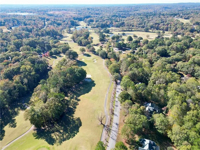 an aerial view of city and lake view