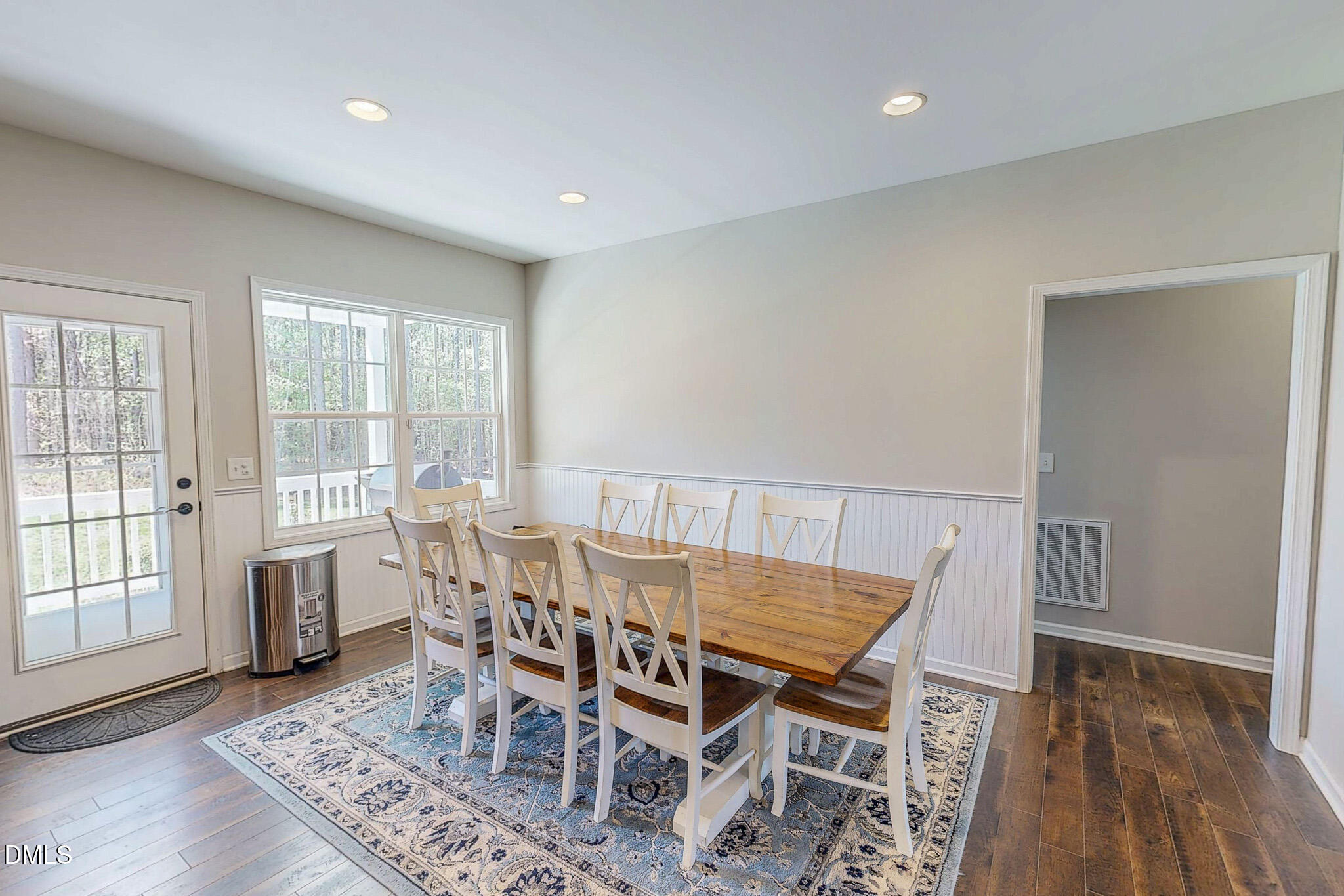 2223 Holeman Ashley Road Timberlake, NC 27583 - Photo 11 of 42 a view of a dining room with furniture window and wooden floor