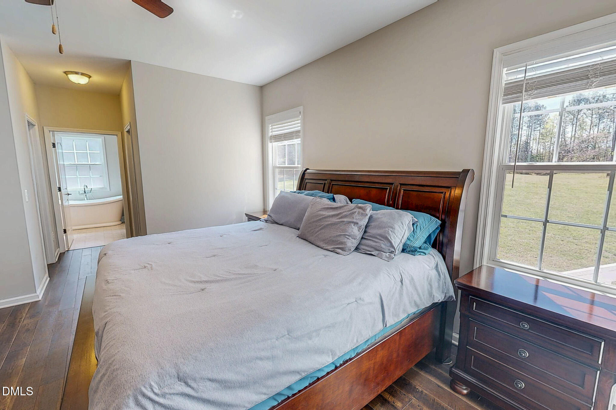2223 Holeman Ashley Road Timberlake, NC 27583 - Photo 15 of 42 a bedroom with a bed and window