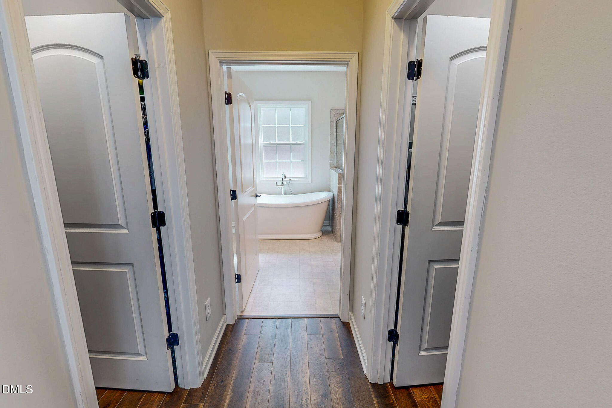 2223 Holeman Ashley Road Timberlake, NC 27583 - Photo 17 of 42 a view of a bathroom from a hallway