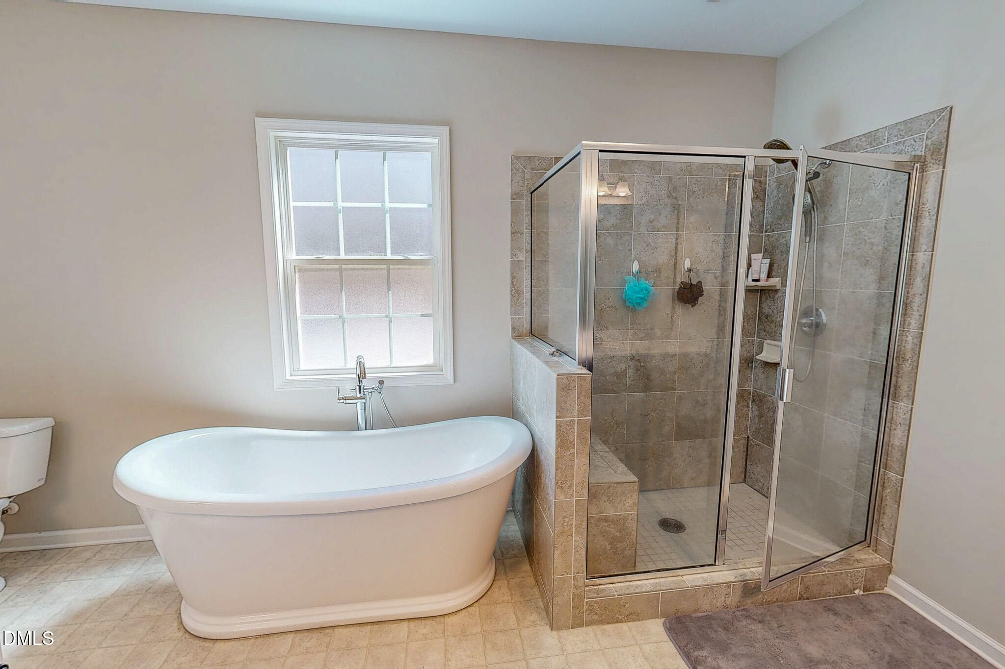 2223 Holeman Ashley Road Timberlake, NC 27583 - Photo 19 of 42 a bathroom with a shower and a mirror