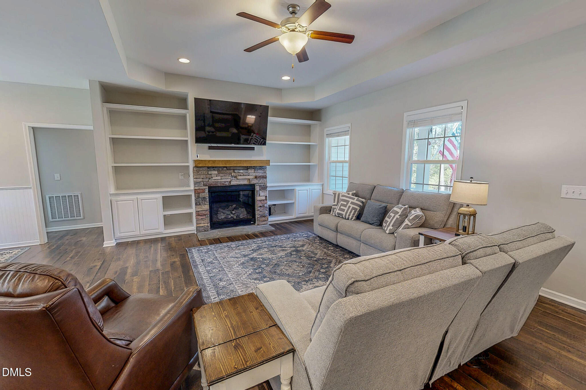 2223 Holeman Ashley Road Timberlake, NC 27583 - Photo 3 of 42 a living room with furniture or chandelier and a fireplace