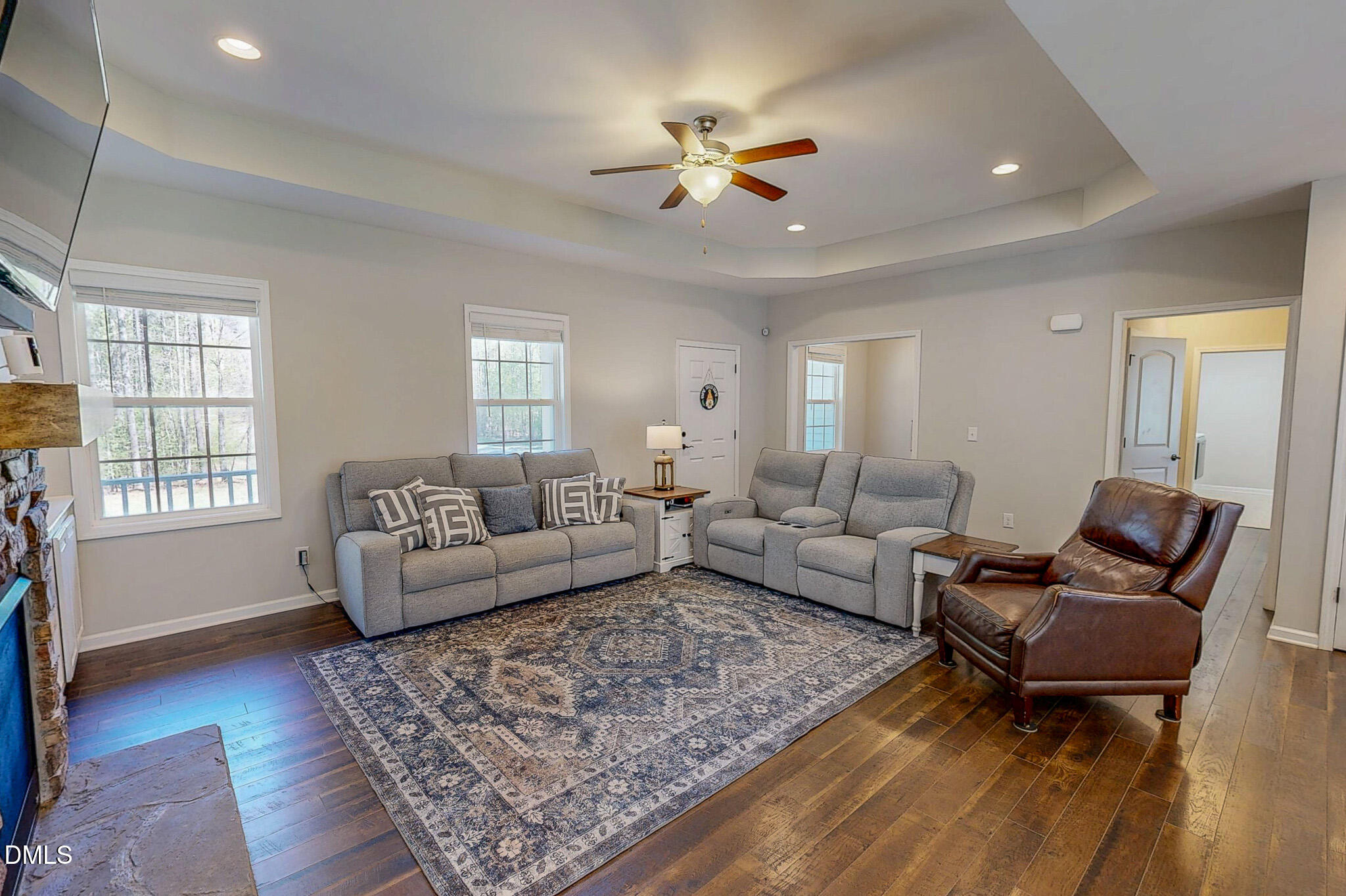 2223 Holeman Ashley Road Timberlake, NC 27583 - Photo 32 of 42 a living room with furniture and a rug
