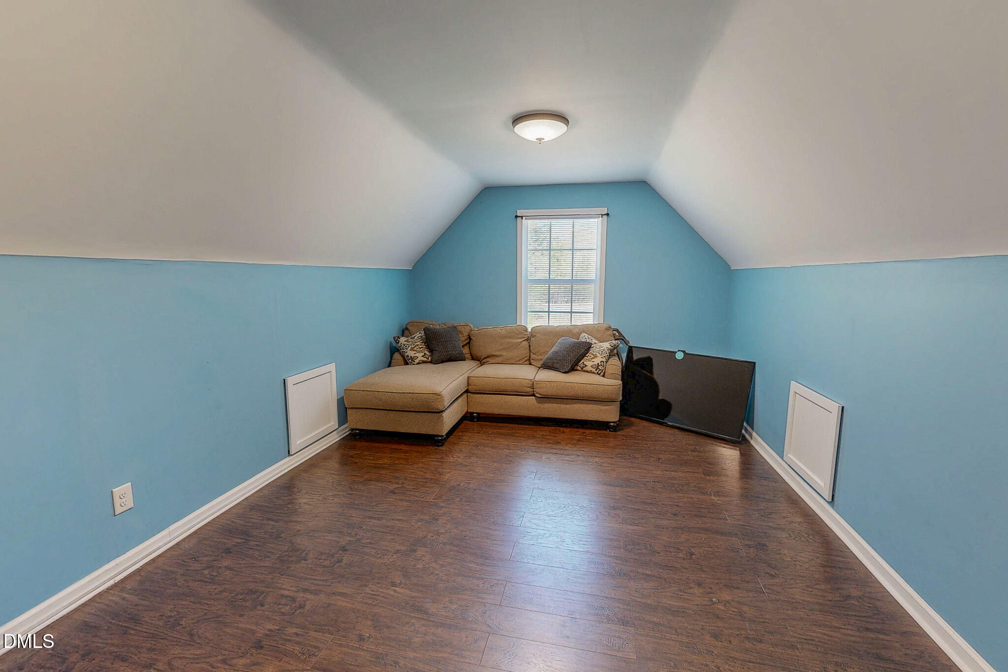 2223 Holeman Ashley Road Timberlake, NC 27583 - Photo 38 of 42 a living room with furniture and a window