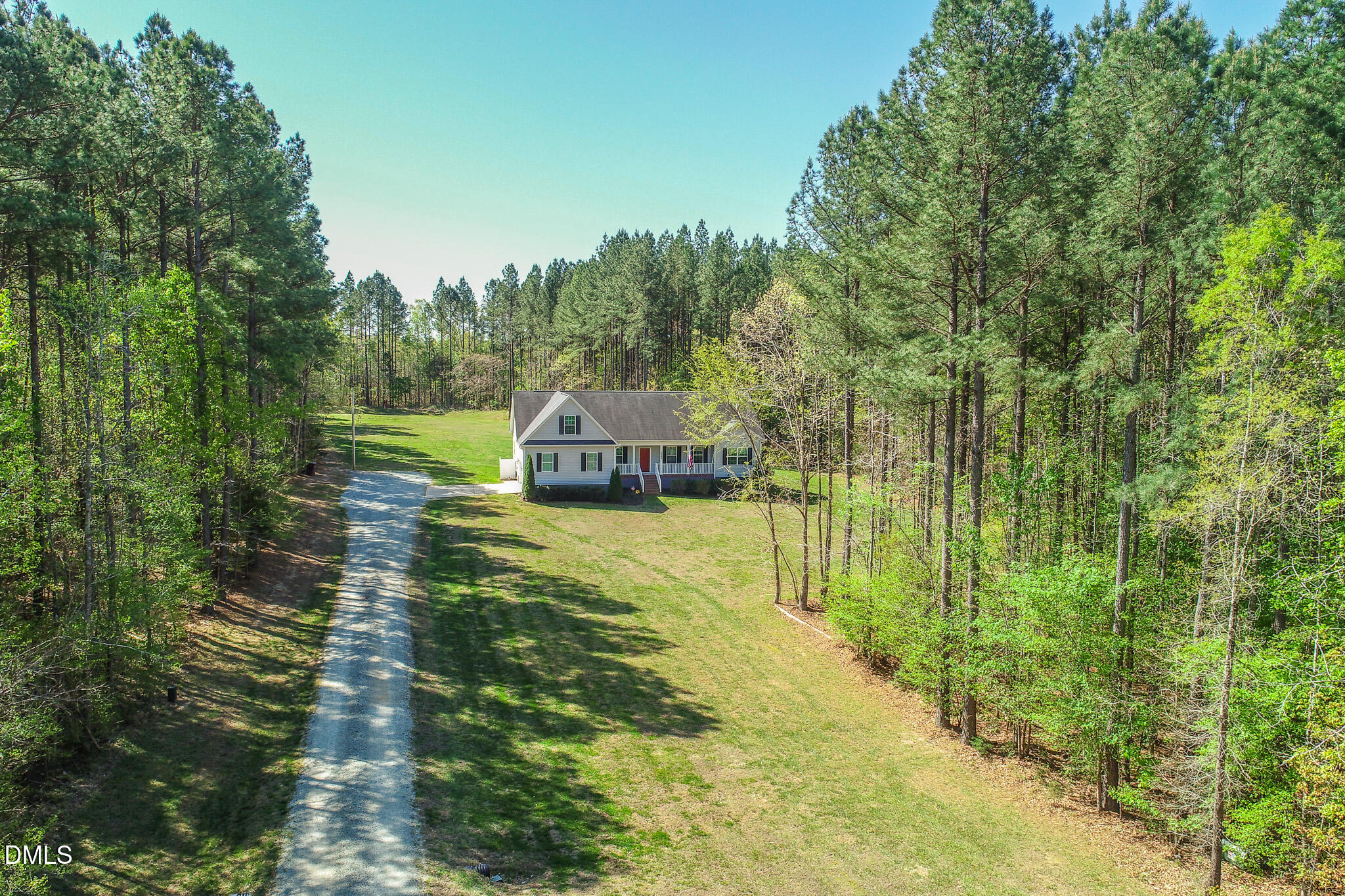 2223 Holeman Ashley Road Timberlake, NC 27583 - Photo 5 of 42 a view of a lake with a big yard