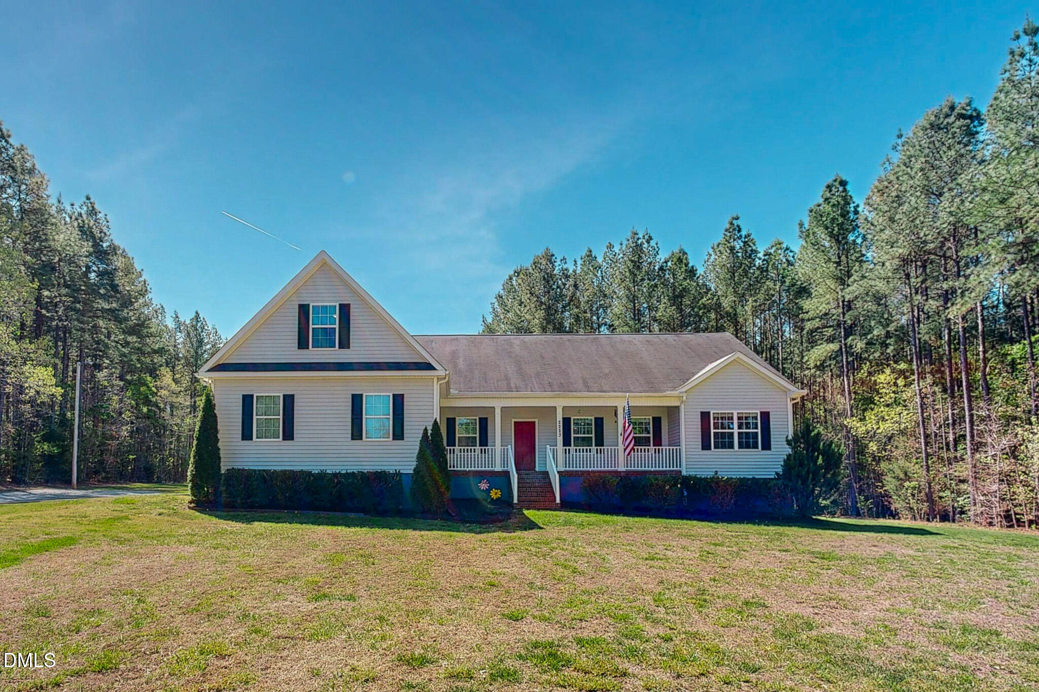 2223 Holeman Ashley Road Timberlake, NC 27583 - Photo 8 of 42 a front view of a house with yard porch and green space
