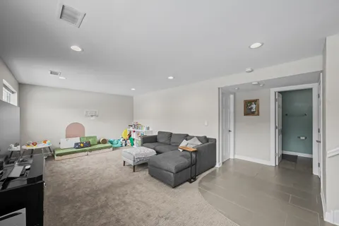 a living room with furniture and a couch