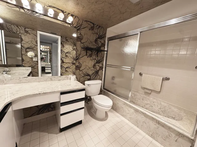 a view of an empty room with a balcony