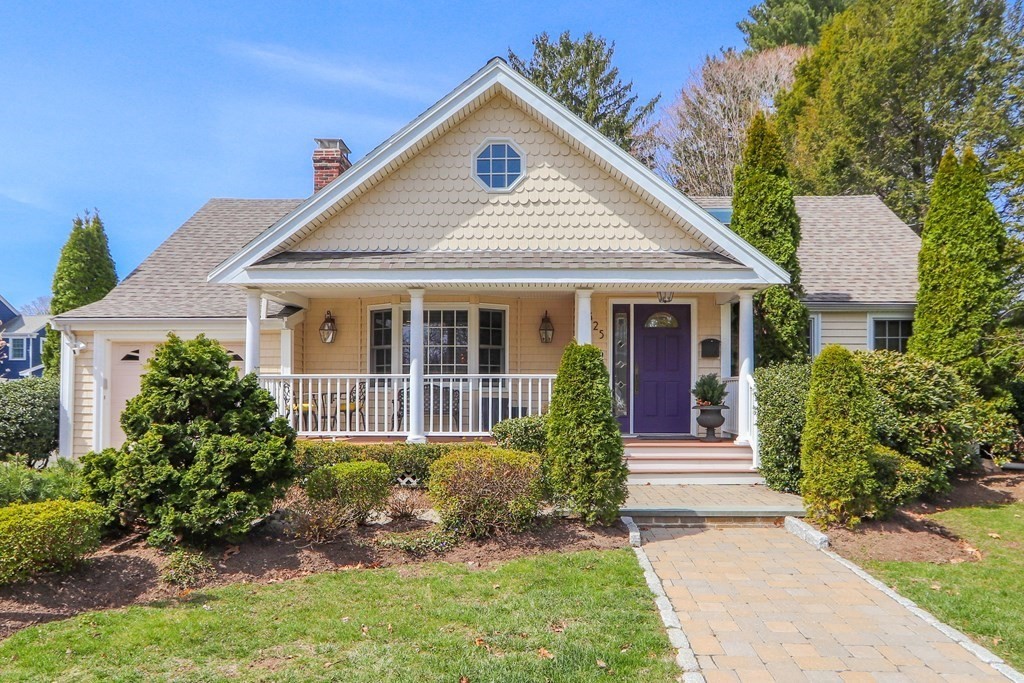 325 Manning Street Needham, MA 02492 - Photo 2 of 31 a front view of a house with a yard