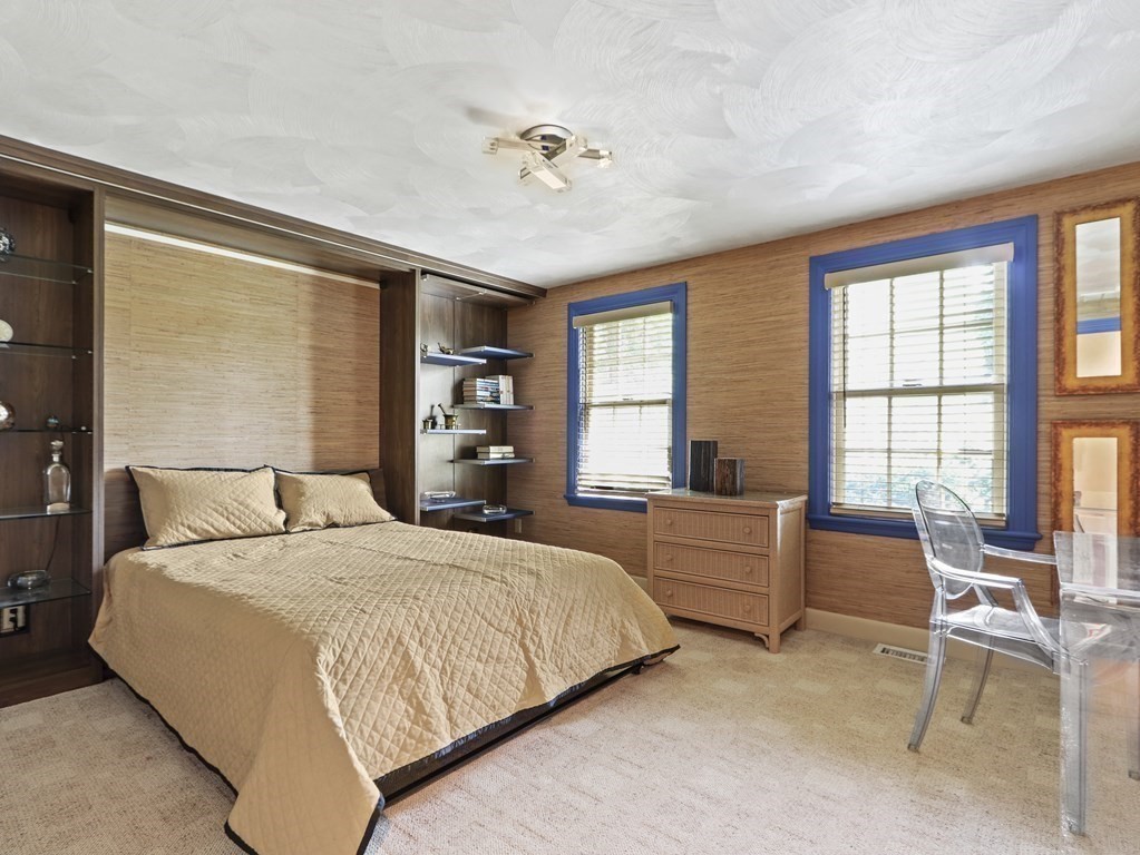 325 Manning Street Needham, MA 02492 - Photo 21 of 31 a bedroom with a bed and a large window