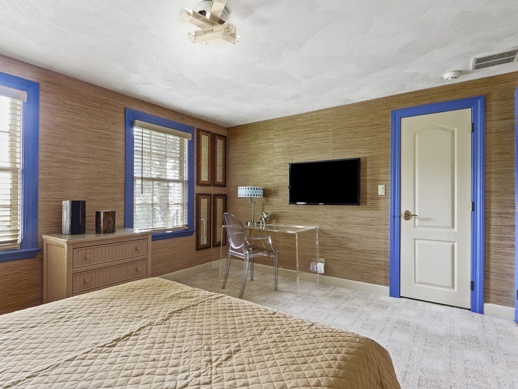 325 Manning Street Needham, MA 02492 - Photo 22 of 31 a bedroom with furniture window and flat screen tv
