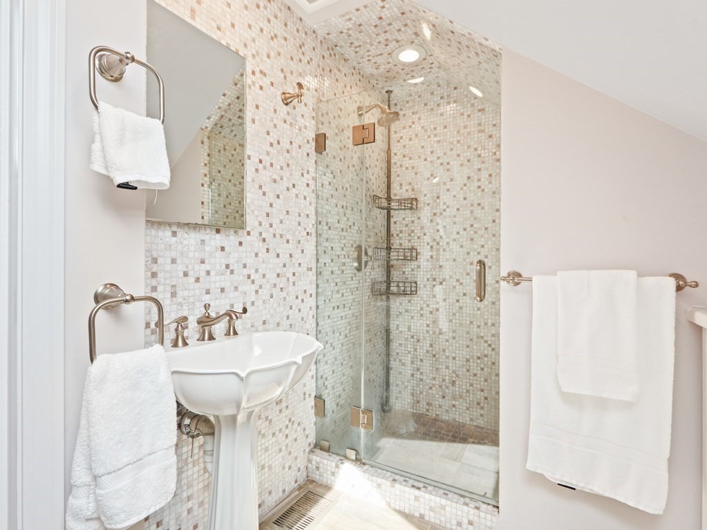 325 Manning Street Needham, MA 02492 - Photo 27 of 31 a bathroom with a sink mirror and shower