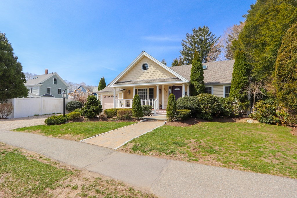 325 Manning Street Needham, MA 02492 - Photo 3 of 31 a front view of a house with a yard