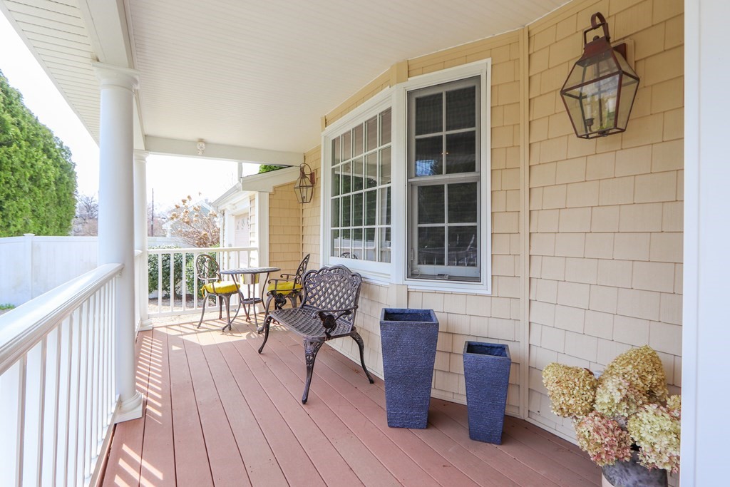 325 Manning Street Needham, MA 02492 - Photo 4 of 31 a balcony view with a seating space