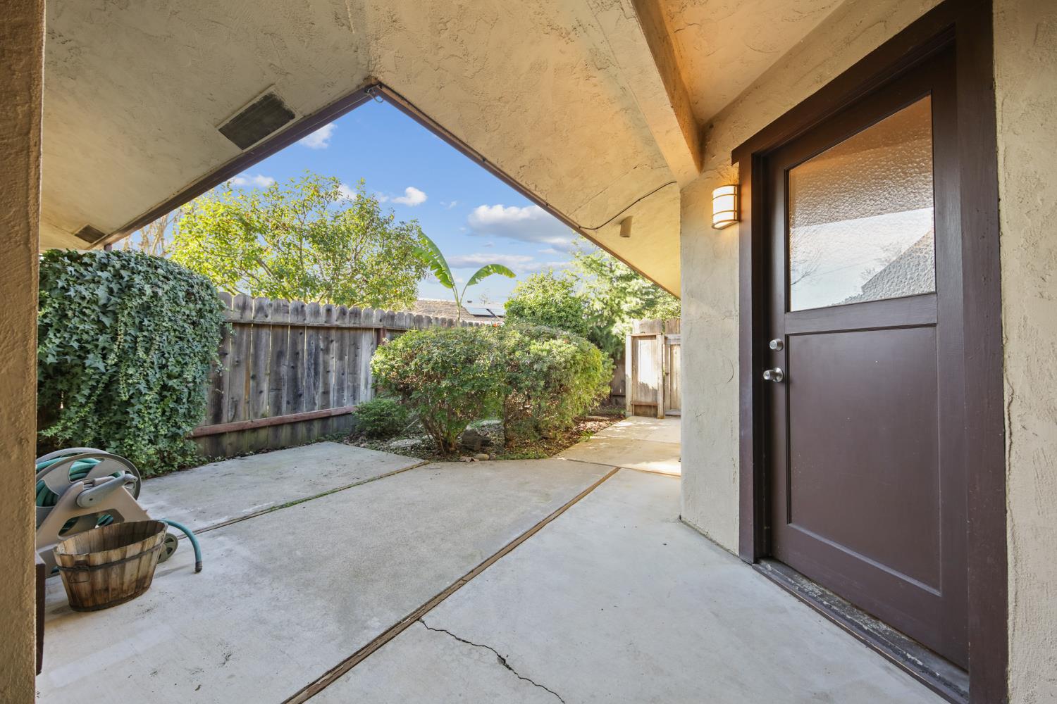 1001 West Lincoln Road, Unit A Stockton, CA 95207 - Photo 27 of 32 a view of backyard with a garden and plants