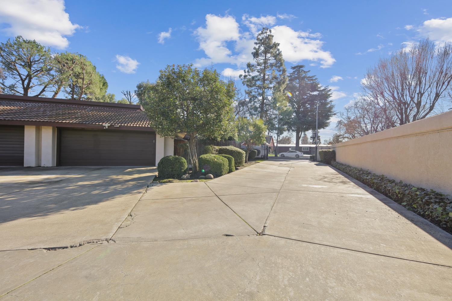 1001 West Lincoln Road, Unit A Stockton, CA 95207 - Photo 28 of 32 a view of a white house with a yard