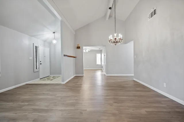 a view of a livingroom with wooden floor