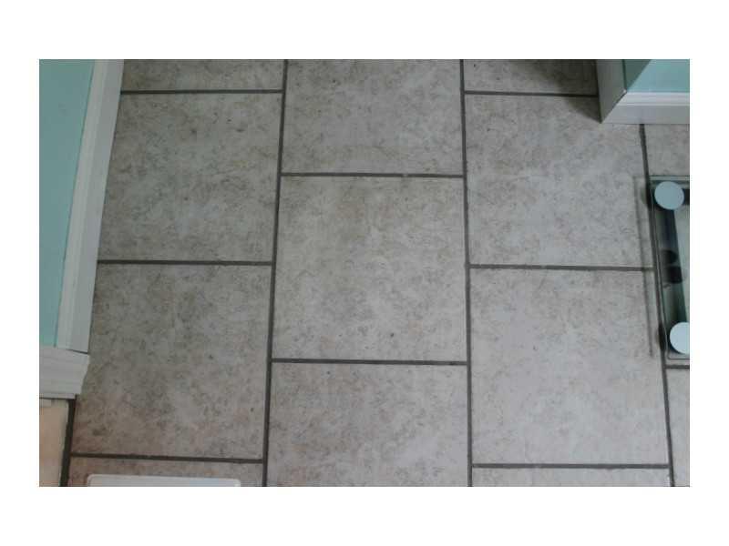 211 Intervale Road New Gloucester, ME 04260 - Photo 13 of 17 Other. New Tile Flooring in Bathroom