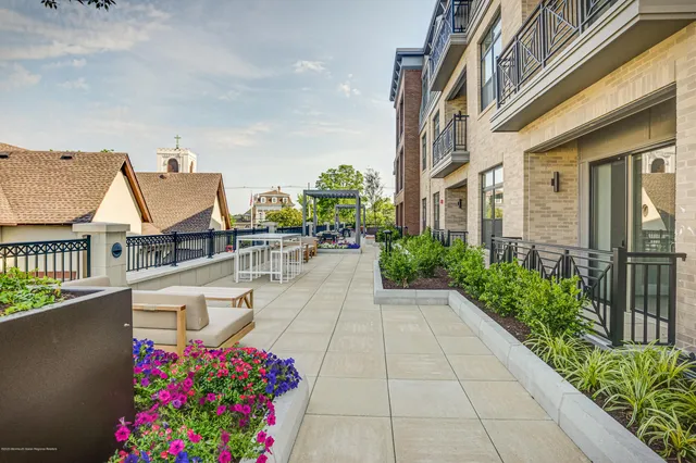 a view of front door and outdoor seating