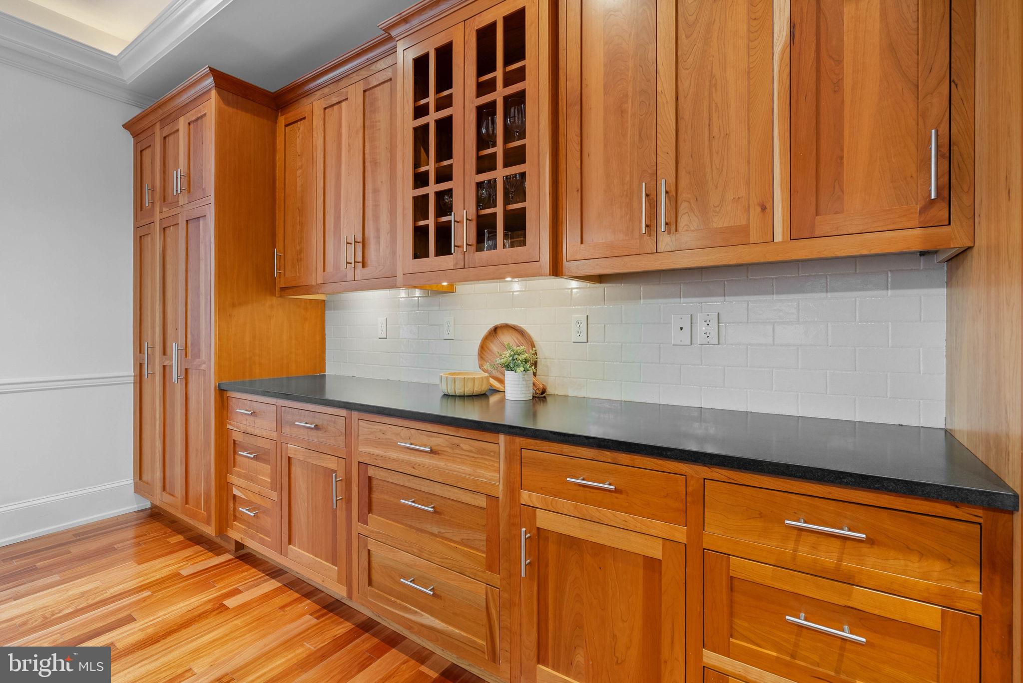 2019 Rittenhouse Square Philadelphia, PA 19103 - Photo 19 of 54 a kitchen with granite countertop cabinets and a wooden floor