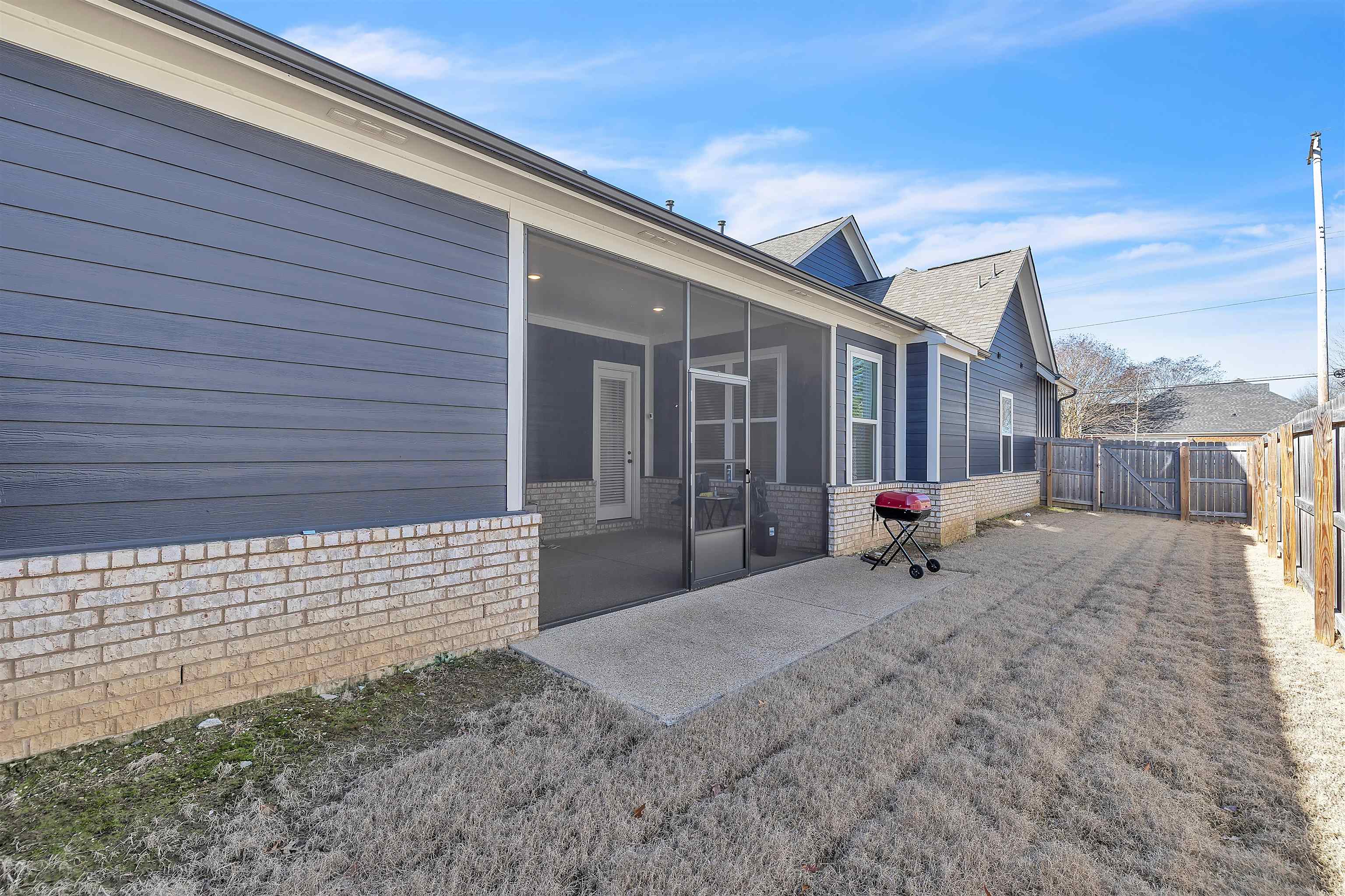 5592 Gerber Road Arlington, TN 38002 - Photo 26 of 28 a backyard of a house with seating space