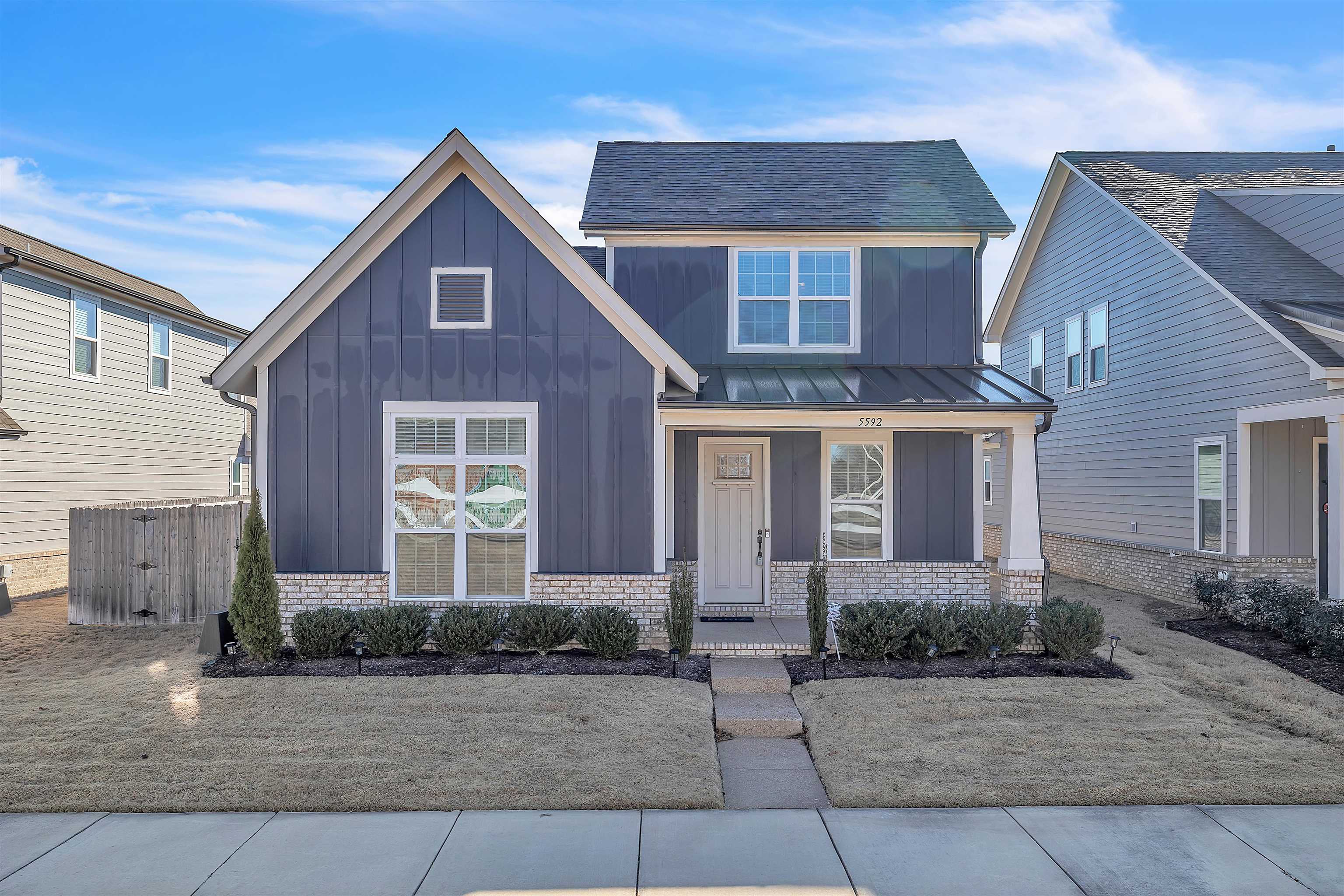 5592 Gerber Road Arlington, TN 38002 - Photo 28 of 28 a front view of a house with a yard