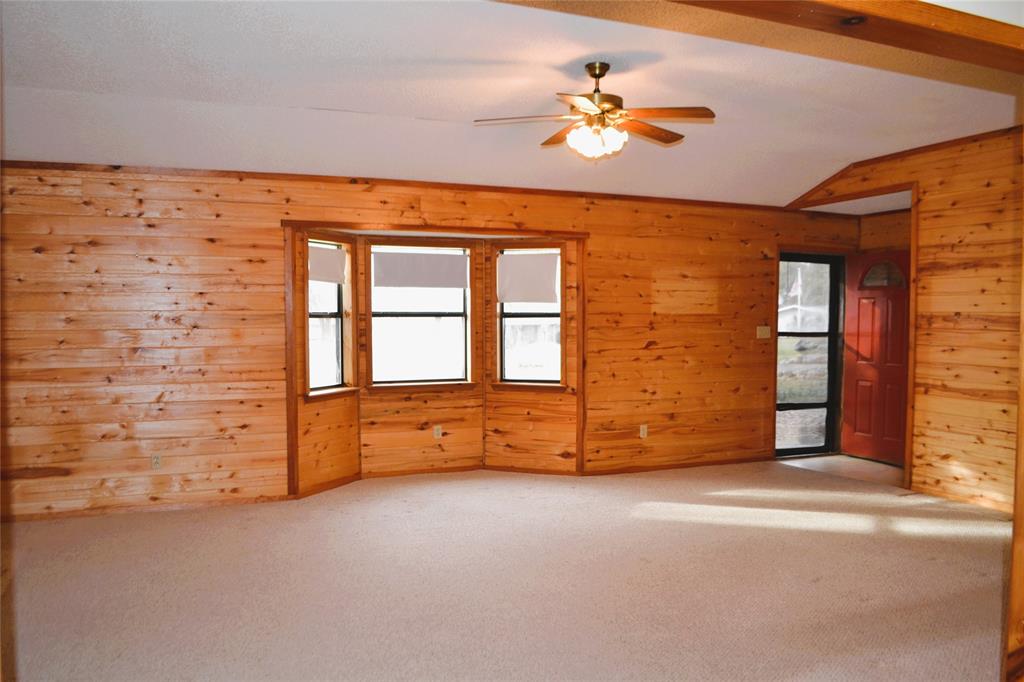 213 County Road 1997 Yantis, TX 75497 - Photo 11 of 28 a view of an empty room with a window