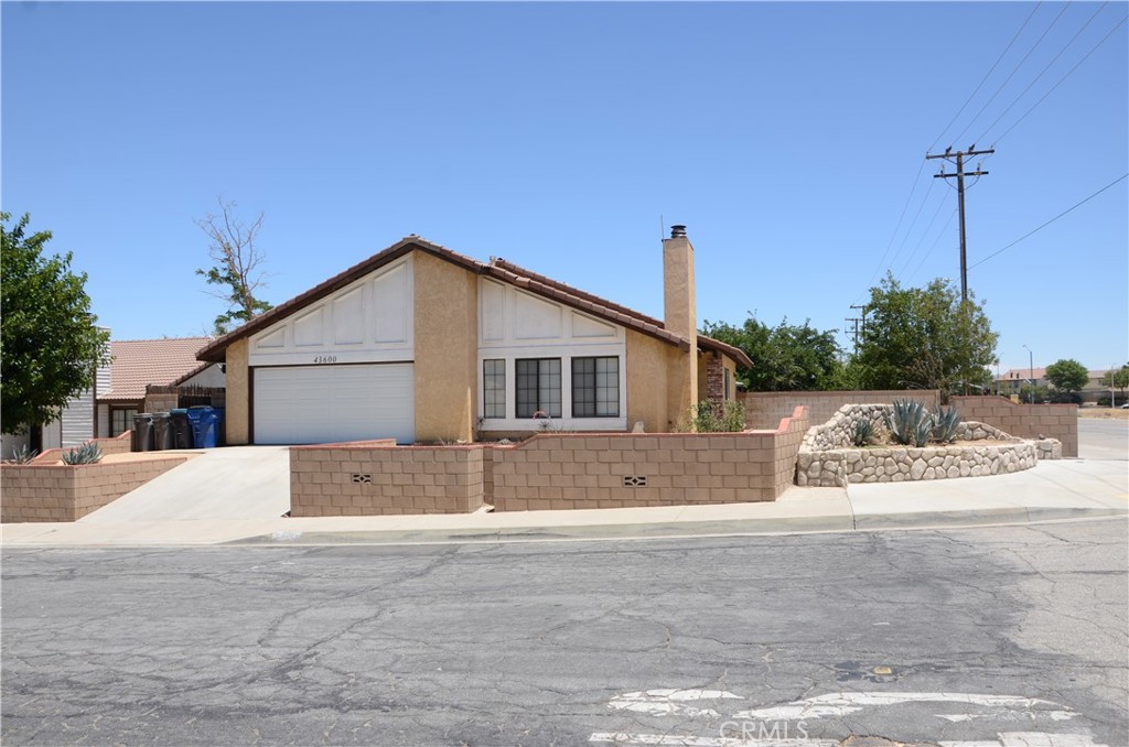 43600 Santa Rosa Circle Lancaster, CA 93535 - Photo 5 of 25 a house view with a outdoor space