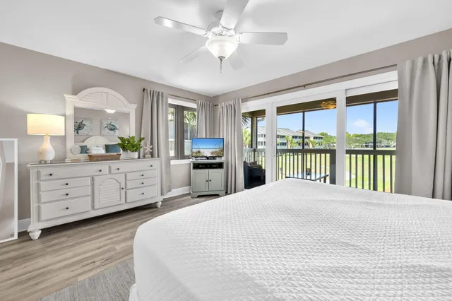a bathroom with a double vanity sink mirror and shower