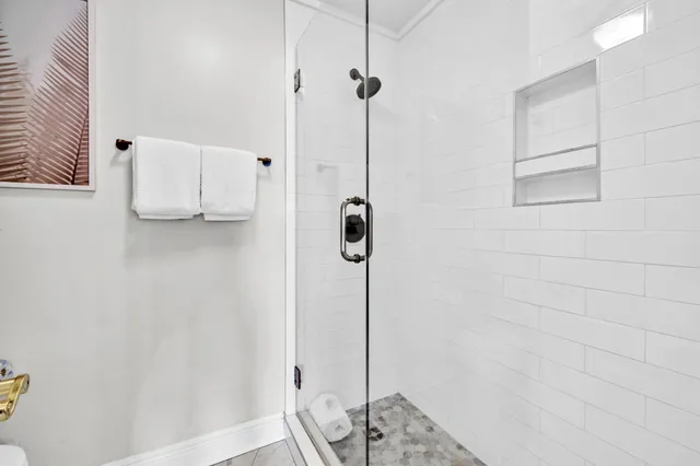 a view of a balcony with wooden floor