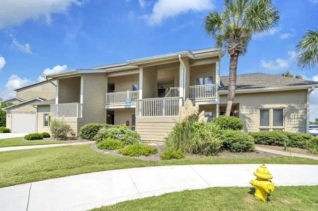 a view of a lake with a big yard