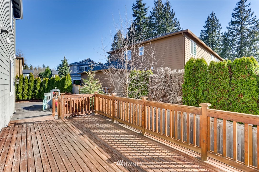 3110 222nd Street Southeast Bothell, WA 98021 - Photo 22 of 23 a view of a wooden roof deck