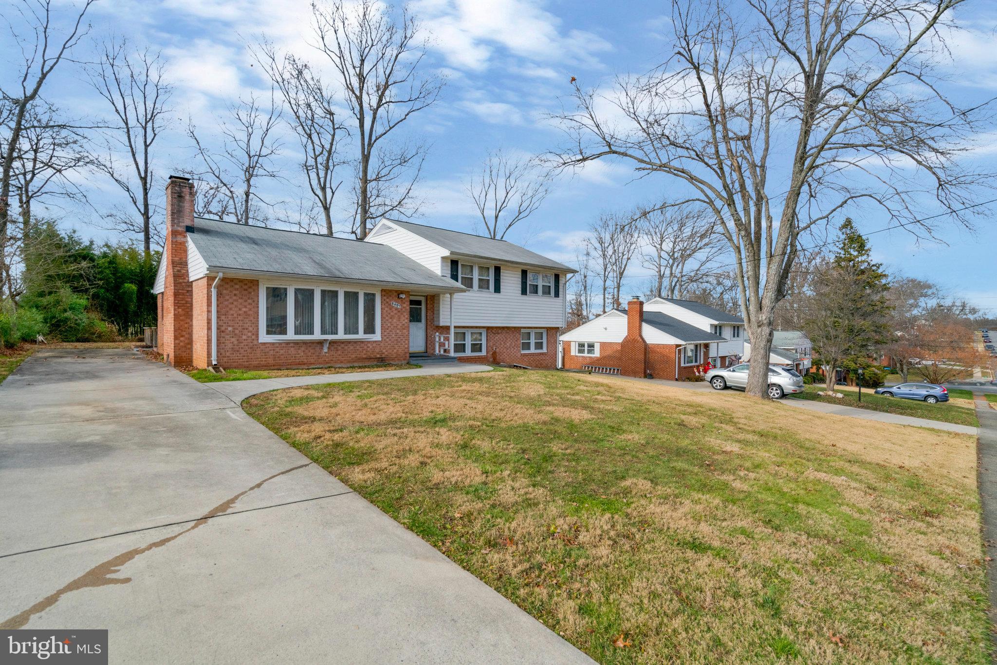 5407 Moultrie Road Springfield, VA 22151 - Photo 3 of 11 Front Exterior with Spacious Driveway