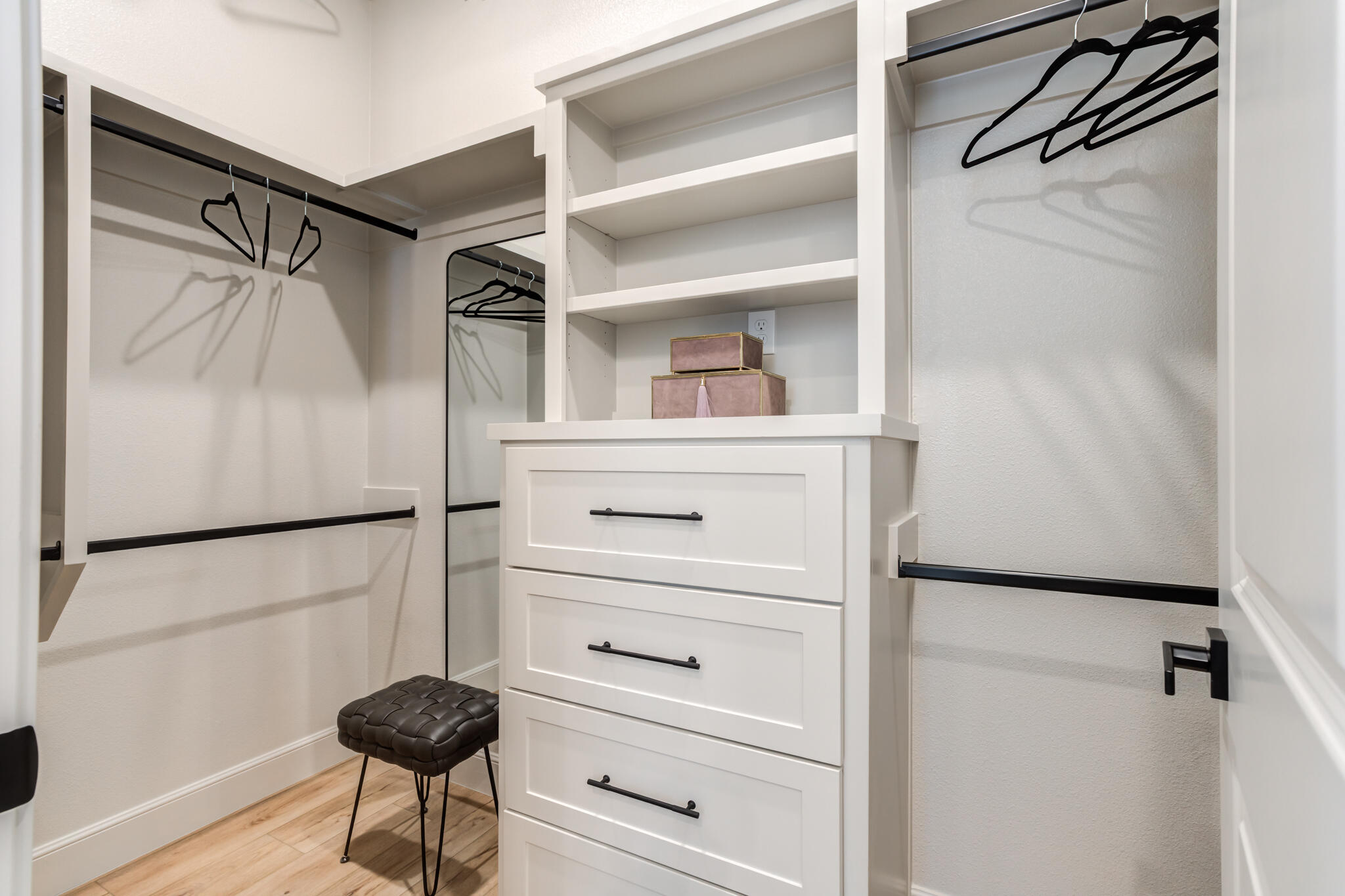 609 North 15th Street Wolfforth, TX 79382 - Photo 28 of 76 a view of walk in closet with clothes and shoes